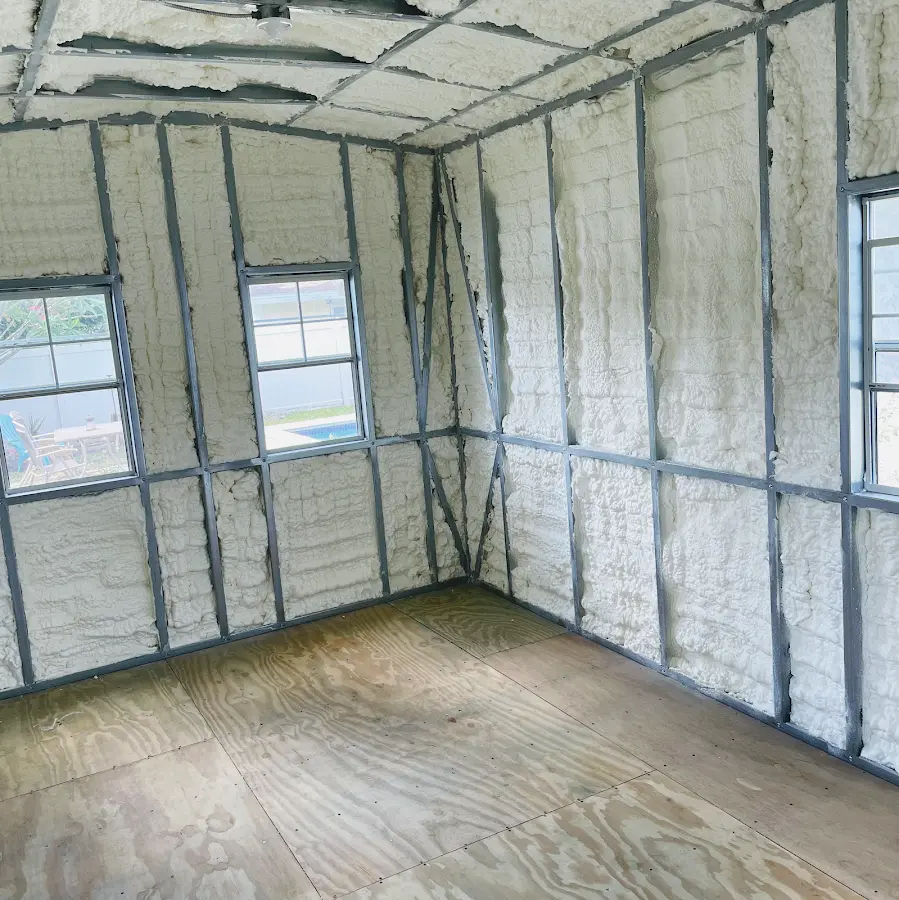 Closed-cell spray foam insulation applied to wall cavities in a residential project in Caldwell